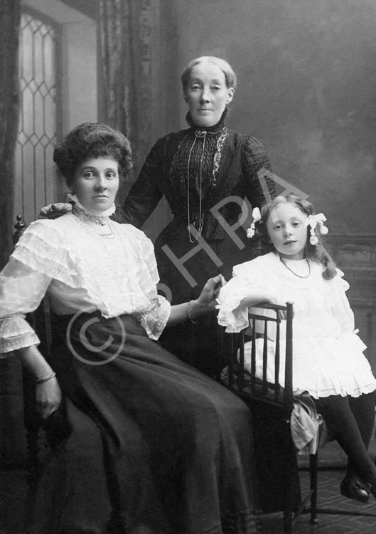 Andrew Paterson portrait of Agnes MacLennan (standing) with daughter Georgina Smith and grand-daughter Ruth. Georgina married Alexander Smith of Elgin who operated a drapery business in Queensgate, Inverness, in 1902. Submitted by Susan Edgar Mutch. (AP/H-0292) 
