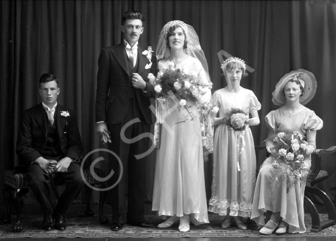 Portrait. The bridesmaid on the far right is also in images 30557a/b under the name MacKinnon. #.....