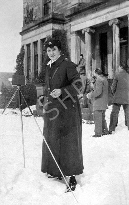 Amateur photographer Mary Millicent May Fraser outside Hedgefield House c1918. May Fraser was a VAD nurse working at the Hedgefield House Red Cross Hospital during the First World War. Submitted by her daughter Heather Watts. (Fraser-Watts Collection)